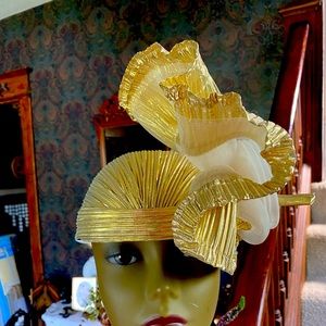 Pretty spectacular Gold Hat by Designer Sylvia. Exquisite detail.